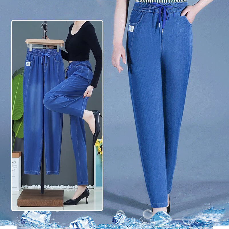 A pair of high waist ultra-stretch mom jeans from Arenzza, shown in a natural pose, highlighting the fit and denim fabric.