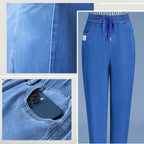 A pair of high waist ultra-stretch mom jeans by Arenzza, showcasing the fit and denim fabric on a mannequin.