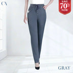 A pair of high waist ultra-stretch mom jeans from Arenzza, showcased in a stylish pose highlighting the fit and denim fabric.