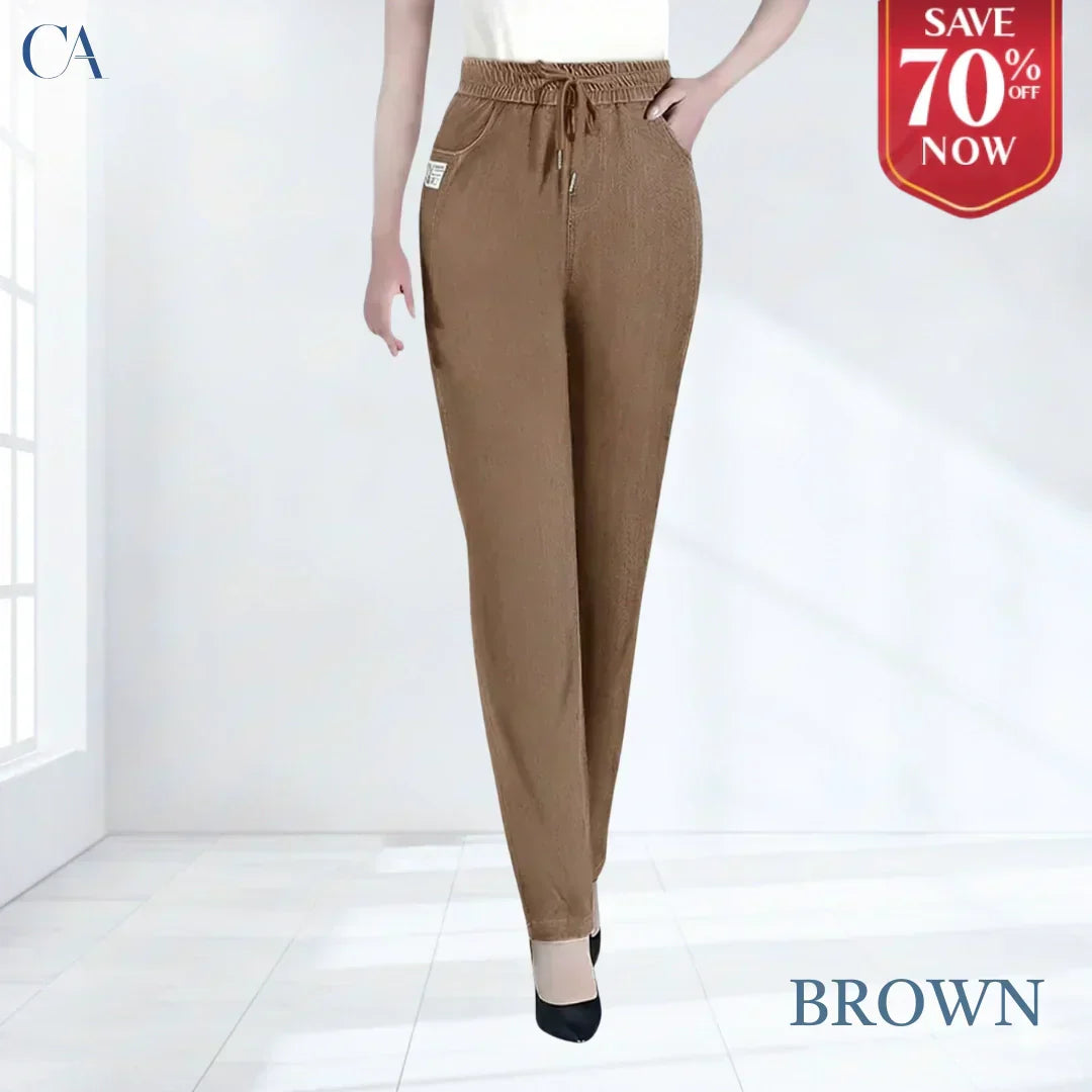 A pair of Arenzza high waist ultra-stretch mom jeans, showcasing a fitted design and classic denim look.