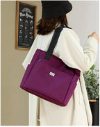 Arenzza large capacity nylon shoulder bag with multiple pockets, water-repellent, designed for versatile clothing and accessories storage.