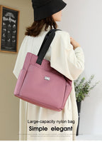 Arenzza large capacity water-repellent nylon shoulder bag with multiple pockets, shown open with compartments and adjustable strap.