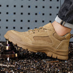 A pair of Arenzza industrial safety shoes featuring anti-slip soles, puncture resistance, and heat-resistant design for workplace safety.