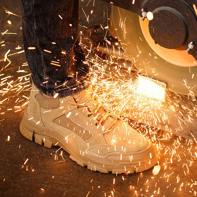 A pair of industrial-grade Arenzza safety shoes with anti-slip soles, puncture resistance, and heat-resistant features for work safety.