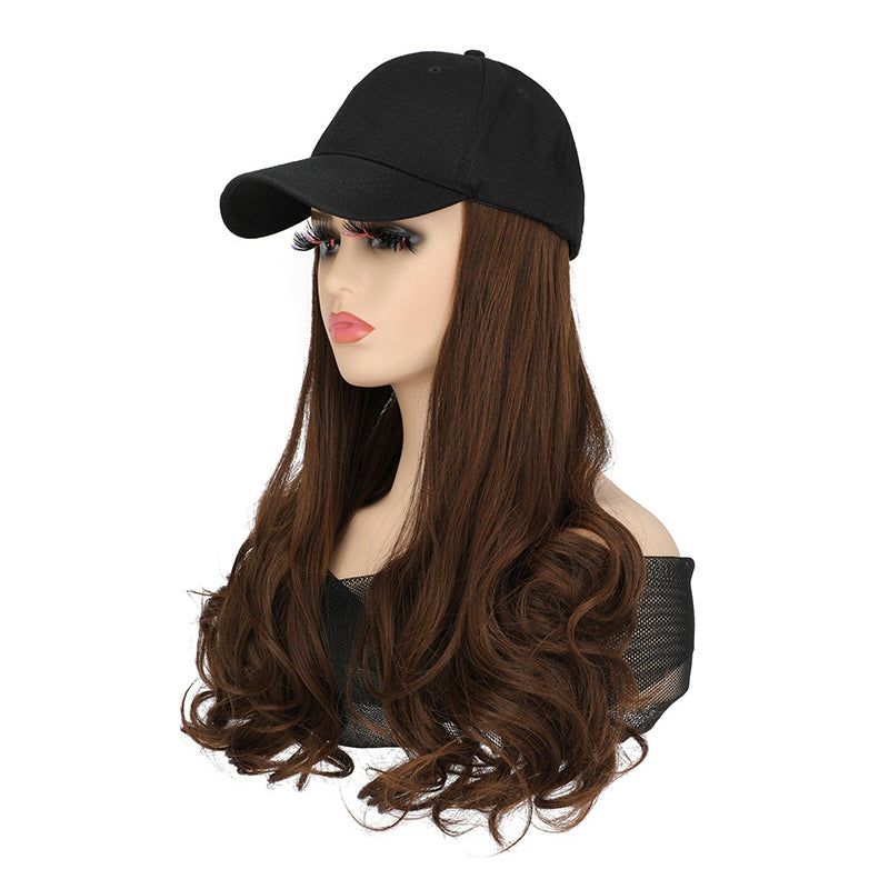 A woman wearing a curly 2-in-1 baseball cap wig from Arenzza, showcasing the stylish, versatile hair accessory.