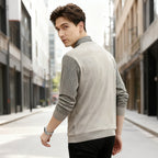 A man wearing Arenzza layered clothing with a sharp, stylish look, showcasing effortless fashion and modern design.