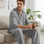 A men's hooded casual loose-fit top and pants 2-piece set by Arenzza, shown in a relaxed fit, suitable for casual wear.