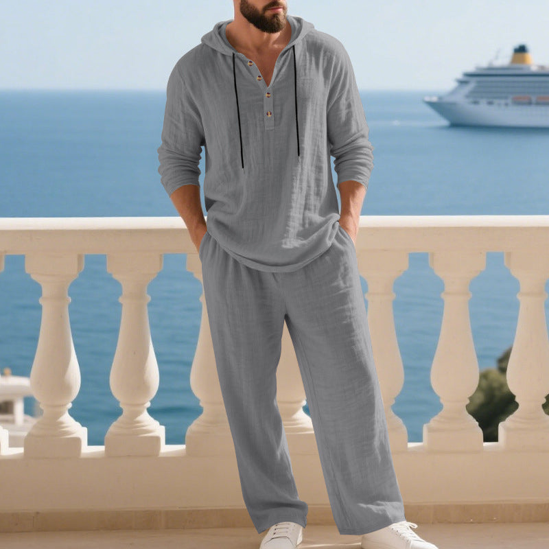 A Men’s Arenzza hooded casual loose top and pants 2-piece set, displayed on a mannequin, in a relaxed fit and comfortable style.