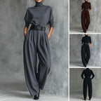 Aarenzza women's elegant turtleneck top and high-waist pants set with a free belt, displayed in a stylish clothing ensemble.