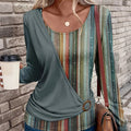 Aarenza long sleeve striped patchwork T-shirt with multicolored patterns, casual fit, and classic crew neckline.