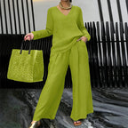 A woman wearing the Arenzza women's V-neck lounge set with wide-leg pants, comfortable and stylish in soft fabric.