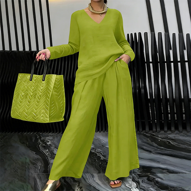 A woman wearing the Arenzza women's V-neck lounge set with wide-leg pants, comfortable and stylish in soft fabric.