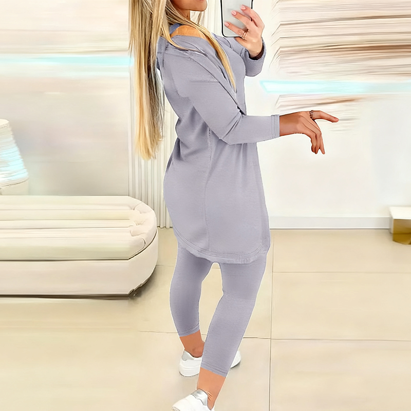 Women’s casual fashion 3-piece clothing set by Arenzza, featuring a stylish top, pants, and jacket displayed on a hanger.