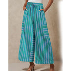 Women’s striped wide-leg drawstring pants by Arenzza, showing the relaxed fit and stylish waist tie on a light-colored background.