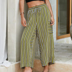 Women's striped wide-leg drawstring pants by Arenzza, featuring a casual fit with colorful horizontal stripes and a relaxed silhouette.