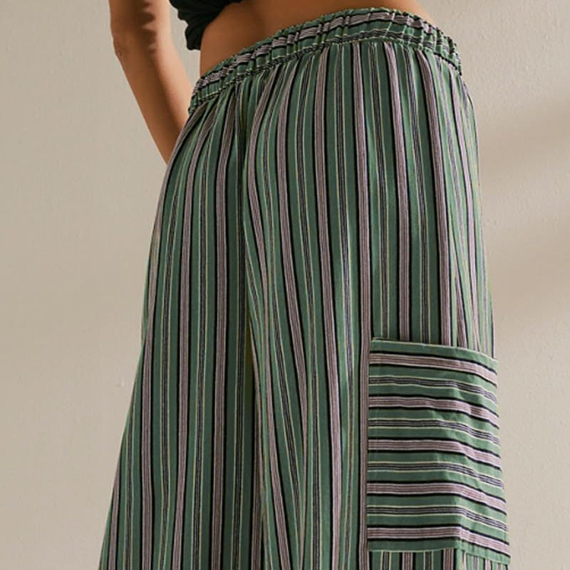 Women's striped wide-leg drawstring pants by Arenzza, featuring a comfortable fit and stylish design, shown on a model.