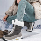 A pair of Arenzza women's non-slip warm zipper snow boots with cozy lining and rugged soles for winter wear.