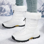 A pair of Arenzza women's non-slip warm zipper snow boots with thick soles and cozy lining, ideal for winter snow trekking.