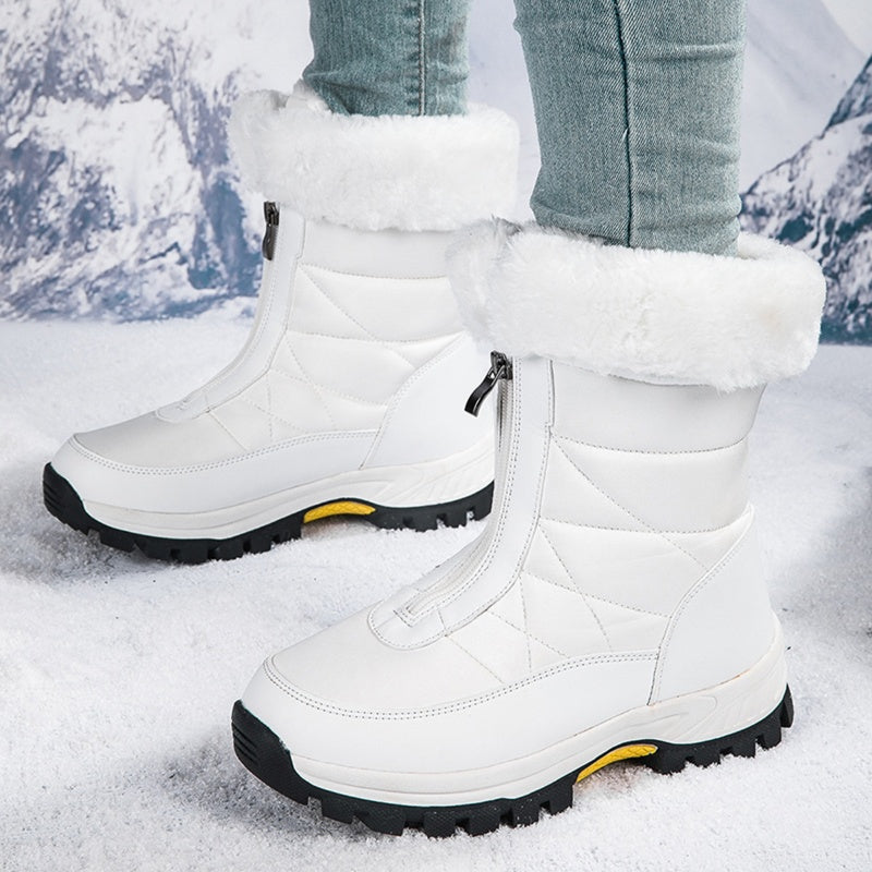 A pair of Arenzza women's non-slip warm zipper snow boots with thick soles and cozy lining, ideal for winter snow trekking.
