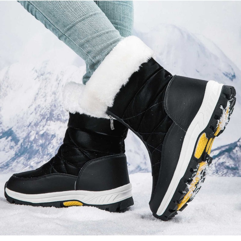 A pair of Arenzza women's non-slip warm zipper snow boots with a cozy interior and sturdy soles for winter wear.