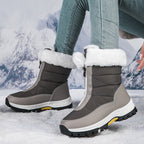 A pair of Arenzza women's non-slip warm zipper snow boots with cozy lining, suitable for winter outdoor wear.