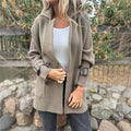 Women’s mid-length lapel double-breasted coat by Arenzza, stylish outerwear with a classic design and tailored fit.