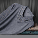 Men's faux two-piece lapel long-sleeve top by Arenzza, stylish clothing with a layered look, shown in a close-up front view.