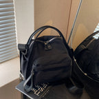 A women's lightweight nylon crossbody handbag by Arenzza, featuring a sleek design and adjustable strap, perfect for casual outings.