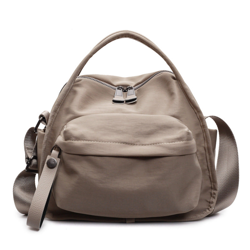 Aarenza women's lightweight nylon crossbody handbag in black with adjustable strap and sleek design, perfect for everyday use.