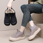 A pair of Arenzza waterproof snow boots with thick soles, designed for warmth and winter weather, featuring a durable exterior and cozy interior.