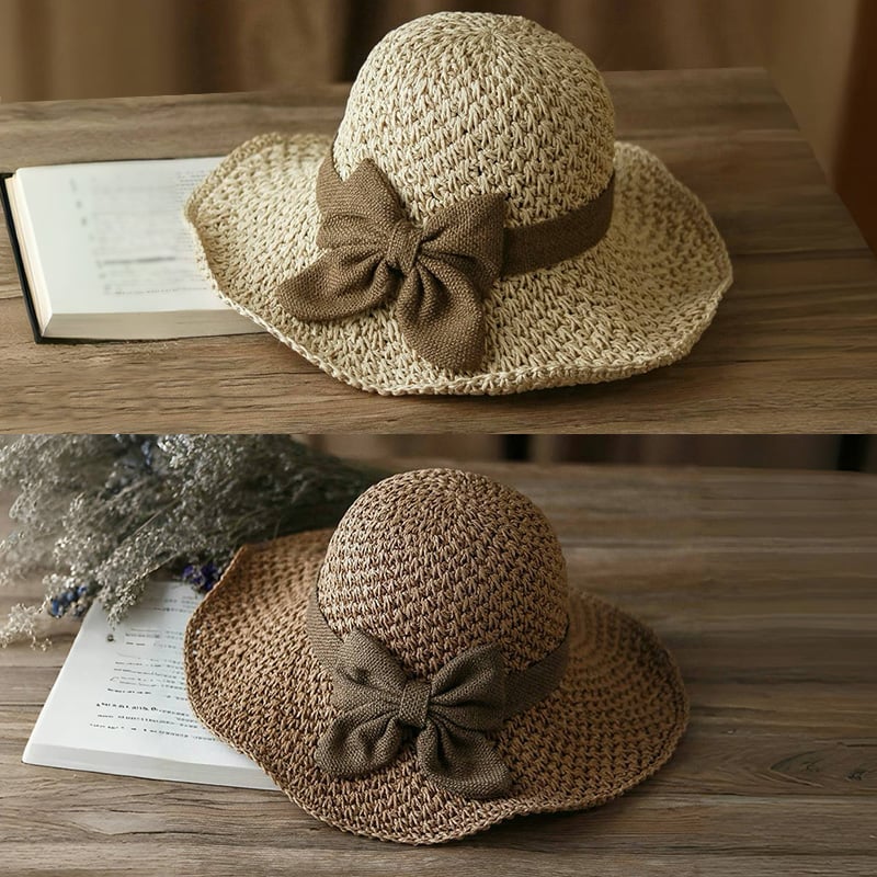 A stylish woven straw sun hat with a bow from Arenzza, perfect for summer outdoor wear.