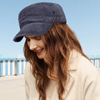 A stylish flat-top duckbill cap by Arenzza featuring a distressed, breathable design in a casual fashion accessory.