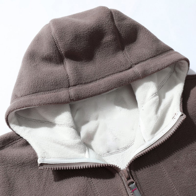 A men's double-faced thick warm hooded jacket by Arenzza, showcasing its cozy, insulated design and soft fabric in a winter setting.