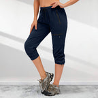 A pair of women's Arenzza hiking quick-drying pants with five zipper pockets, designed for outdoor activities.