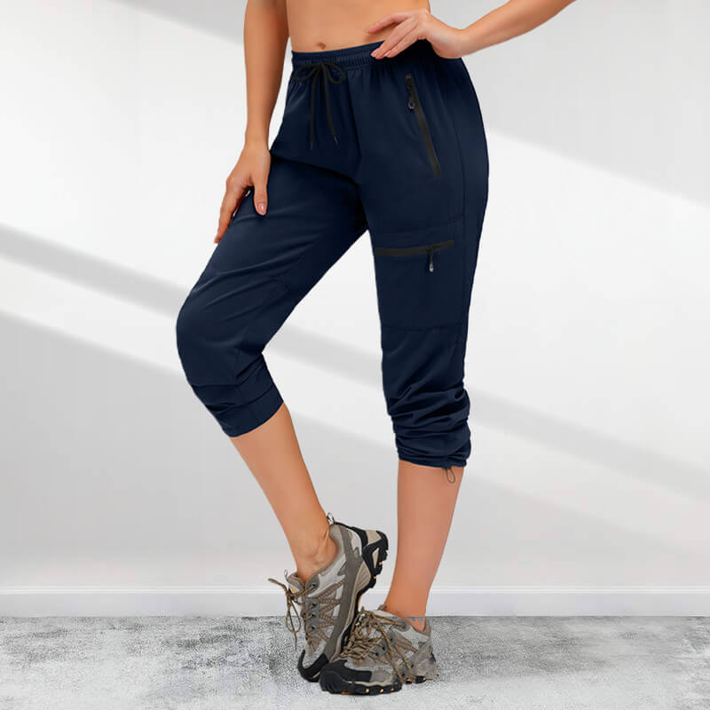 A pair of women's Arenzza hiking quick-drying pants with five zipper pockets, designed for outdoor activities.