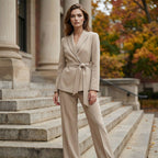 A woman wearing Arenzza's elegant tie-waist blazer and wide-leg pants suit set, stylish and sophisticated outfit for women.
