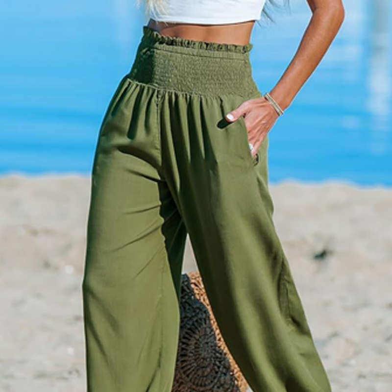Women's smocked high waist harem pants from Arenzza, featuring a relaxed fit and summer-friendly style, shown in the image.