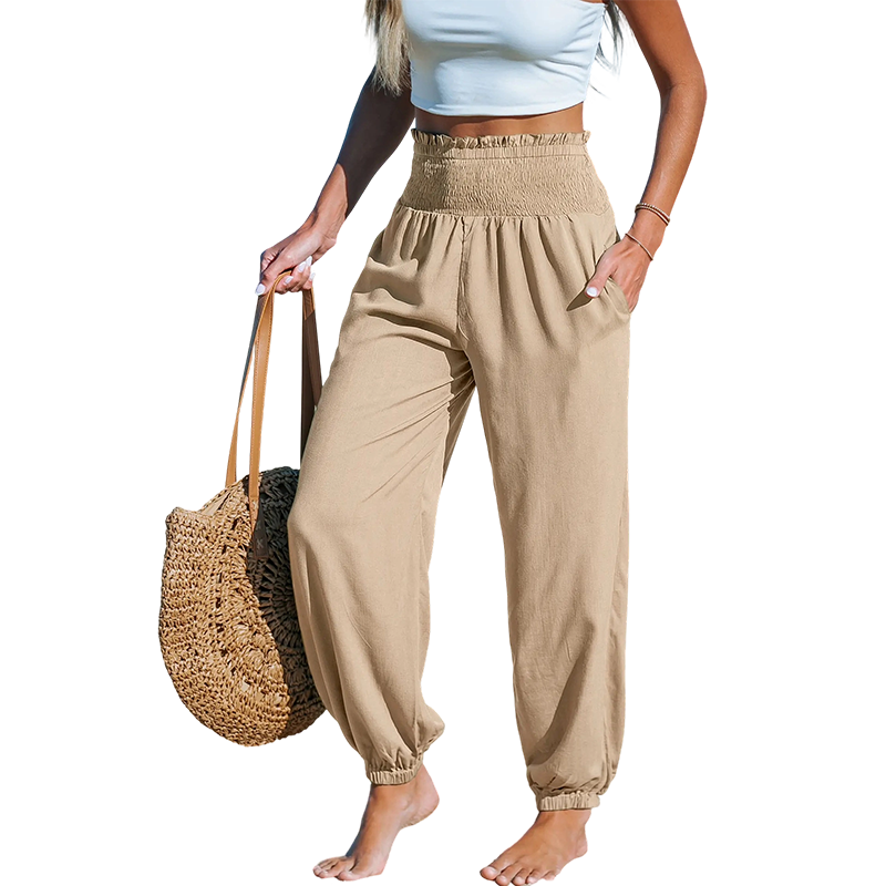 A pair of Arenzza women's smocked high waist harem pants in lightweight fabric, perfect for effortless summer comfort.