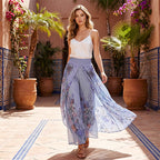Women's printed wide-leg drawstring trousers by Arenzza, featuring a colorful floral pattern and relaxed fit.