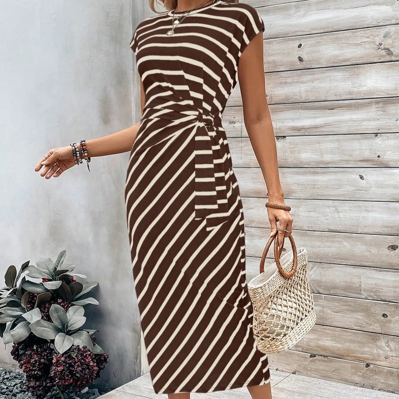 A women's leopard print knot bodycon dress by Arenzza, featuring a flattering design perfect for parties or date nights.