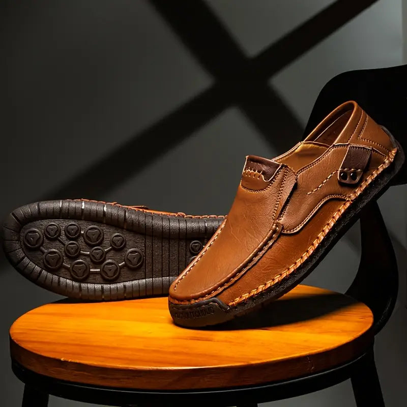 A pair of Arenzza men's breathable calfskin leather shoes, classic and comfortable footwear for everyday wear.