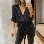 Aarenza women's sparkly V-neck belted jumpsuit, stylish evening wear with shimmering fabric and tailored fit.