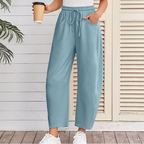 A pair of Arenzza drawstring pocket Capri sweatpants with elastic waist and side pockets, shown in a casual clothing setting.
