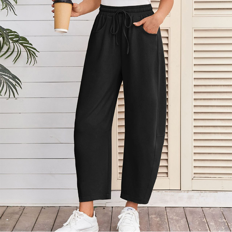 A pair of Arenzza drawstring pocket Capri sweatpants with elastic waist and side pockets, made of soft, comfortable fabric.