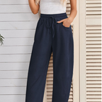 A pair of Arenzza drawstring pocket Capri sweatpants in soft fabric with side pockets and an elastic waistband.