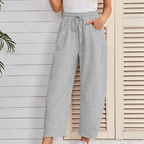 A pair of Arenzza drawstring pocket Capri sweatpants in soft fabric with side pockets and an elastic waistband.