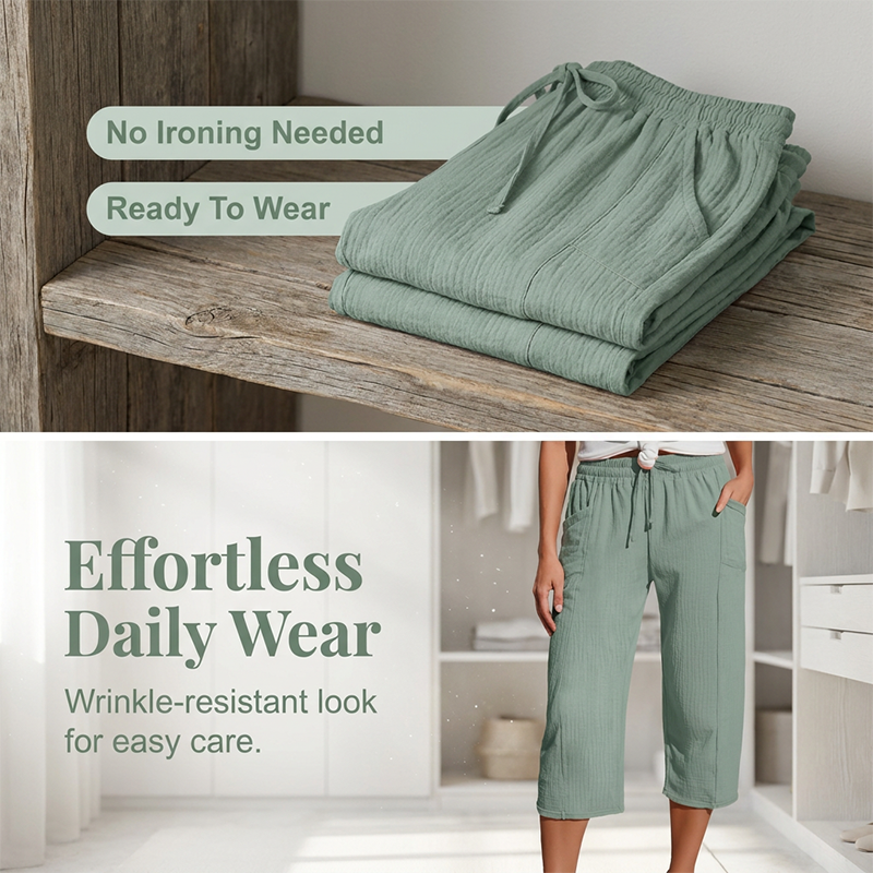 Women's solid-color pleated cotton-linen cropped pants by Arenzza, showing a close-up of the lightweight, breathable fabric and pleated design.