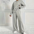 A women’s cozy long-sleeve top and pants set by Arenzza, featuring soft fabric and comfortable fit, ideal for casual wear.