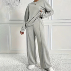 A women’s cozy long-sleeve top and pants set by Arenzza, featuring soft fabric and comfortable fit, ideal for casual wear.