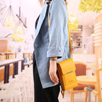 Arenzza women's touch screen messenger bag with water resistance, anti-theft design, and smartphone charging feature, in a stylish black color.
